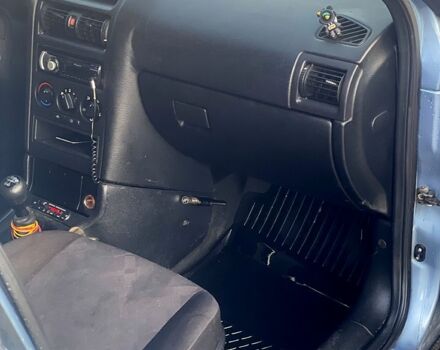 Серый Опель Астра, объемом двигателя 1.4 л и пробегом 350 тыс. км за 4000 $, фото 8 на Automoto.ua