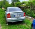 Серый Опель Астра, объемом двигателя 1.4 л и пробегом 250 тыс. км за 3800 $, фото 1 на Automoto.ua