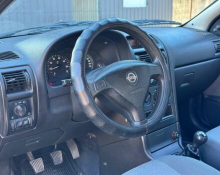 Серый Опель Астра, объемом двигателя 1.4 л и пробегом 116 тыс. км за 4699 $, фото 7 на Automoto.ua