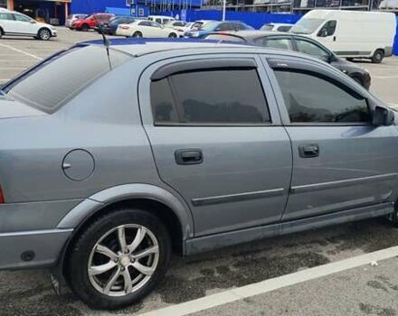 Серый Опель Астра, объемом двигателя 1.4 л и пробегом 156 тыс. км за 4500 $, фото 7 на Automoto.ua