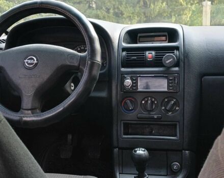 Серый Опель Астра, объемом двигателя 1.4 л и пробегом 260 тыс. км за 3590 $, фото 10 на Automoto.ua