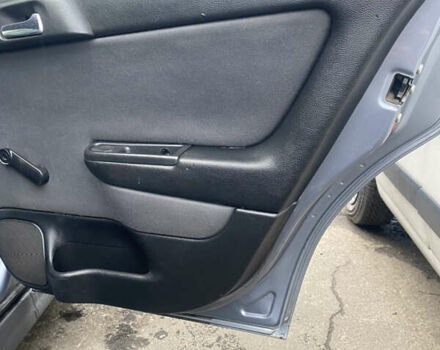 Серый Опель Астра, объемом двигателя 1.4 л и пробегом 283 тыс. км за 3200 $, фото 18 на Automoto.ua