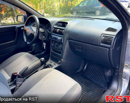 Серый Опель Астра, объемом двигателя 1.4 л и пробегом 250 тыс. км за 2999 $, фото 12 на Automoto.ua