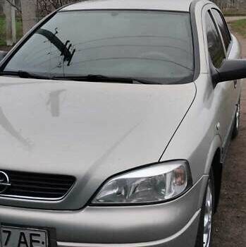 Серый Опель Астра, объемом двигателя 1.36 л и пробегом 362 тыс. км за 3900 $, фото 12 на Automoto.ua