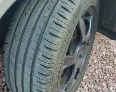 Серый Опель Астра, объемом двигателя 1.4 л и пробегом 338 тыс. км за 4100 $, фото 10 на Automoto.ua