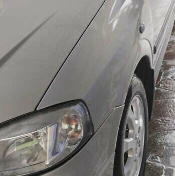 Серый Опель Астра, объемом двигателя 1.36 л и пробегом 362 тыс. км за 3900 $, фото 11 на Automoto.ua