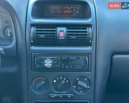 Серый Опель Астра, объемом двигателя 1.4 л и пробегом 116 тыс. км за 4699 $, фото 19 на Automoto.ua