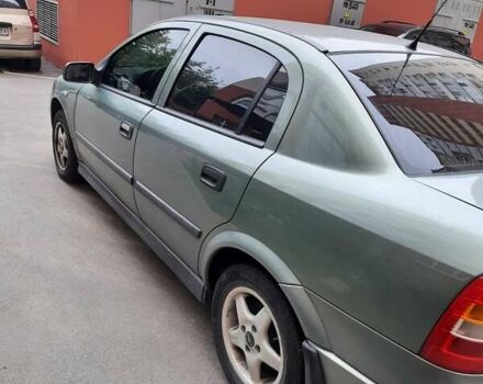 Серый Опель Астра, объемом двигателя 1.4 л и пробегом 190 тыс. км за 4000 $, фото 3 на Automoto.ua