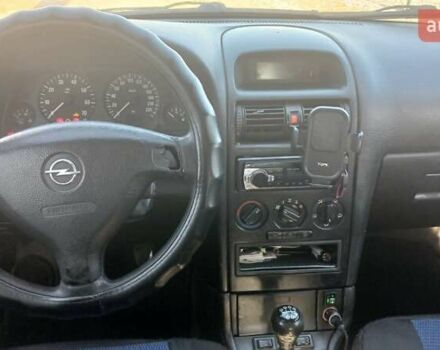 Серый Опель Астра, объемом двигателя 1.4 л и пробегом 400 тыс. км за 2300 $, фото 7 на Automoto.ua