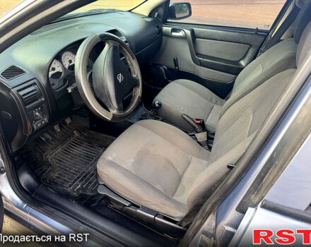 Серый Опель Астра, объемом двигателя 1.4 л и пробегом 200 тыс. км за 3600 $, фото 8 на Automoto.ua