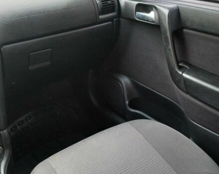 Серый Опель Астра, объемом двигателя 1.4 л и пробегом 260 тыс. км за 3590 $, фото 14 на Automoto.ua