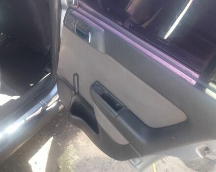 Серый Опель Астра, объемом двигателя 1.4 л и пробегом 230 тыс. км за 2800 $, фото 4 на Automoto.ua