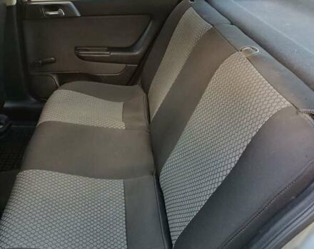 Серый Опель Астра, объемом двигателя 1.4 л и пробегом 189 тыс. км за 3900 $, фото 11 на Automoto.ua