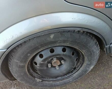 Серый Опель Астра, объемом двигателя 1.4 л и пробегом 205 тыс. км за 3000 $, фото 3 на Automoto.ua