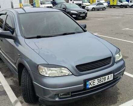 Серый Опель Астра, объемом двигателя 1.4 л и пробегом 156 тыс. км за 4500 $, фото 2 на Automoto.ua