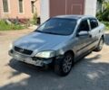 Серый Опель Астра, объемом двигателя 1.4 л и пробегом 221 тыс. км за 1350 $, фото 1 на Automoto.ua