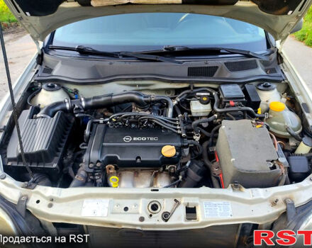 Серый Опель Астра, объемом двигателя 1.4 л и пробегом 198 тыс. км за 3500 $, фото 6 на Automoto.ua