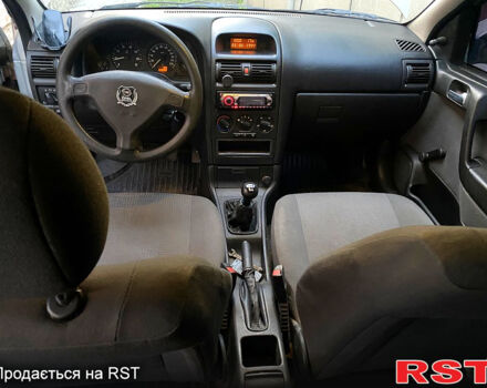 Серый Опель Астра, объемом двигателя 1.4 л и пробегом 200 тыс. км за 3500 $, фото 6 на Automoto.ua