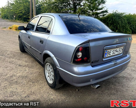 Серый Опель Астра, объемом двигателя 1.4 л и пробегом 200 тыс. км за 3600 $, фото 6 на Automoto.ua