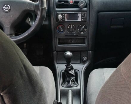 Серый Опель Астра, объемом двигателя 1.4 л и пробегом 260 тыс. км за 3590 $, фото 11 на Automoto.ua
