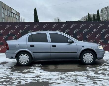 Серый Опель Астра, объемом двигателя 1.36 л и пробегом 186 тыс. км за 4400 $, фото 3 на Automoto.ua