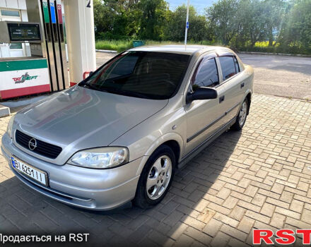 Серый Опель Астра, объемом двигателя 1.4 л и пробегом 200 тыс. км за 3500 $, фото 2 на Automoto.ua