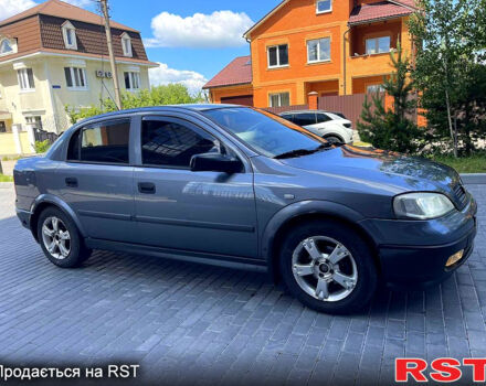 Серый Опель Астра, объемом двигателя 1.4 л и пробегом 250 тыс. км за 2999 $, фото 6 на Automoto.ua