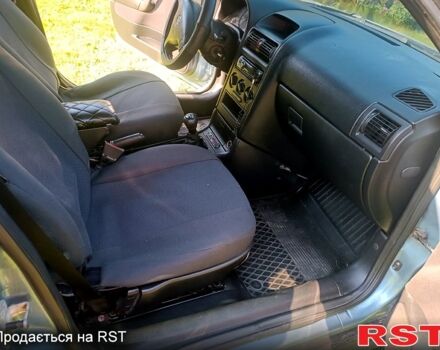 Серый Опель Астра, объемом двигателя 1.4 л и пробегом 218 тыс. км за 3499 $, фото 3 на Automoto.ua