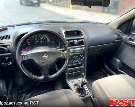 Серый Опель Астра, объемом двигателя 1.4 л и пробегом 250 тыс. км за 2999 $, фото 11 на Automoto.ua