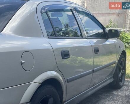 Серый Опель Астра, объемом двигателя 1.4 л и пробегом 172 тыс. км за 3500 $, фото 3 на Automoto.ua