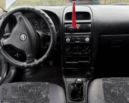 Серый Опель Астра, объемом двигателя 1.4 л и пробегом 201 тыс. км за 3100 $, фото 2 на Automoto.ua