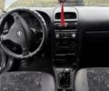 Серый Опель Астра, объемом двигателя 1.4 л и пробегом 201 тыс. км за 3100 $, фото 2 на Automoto.ua