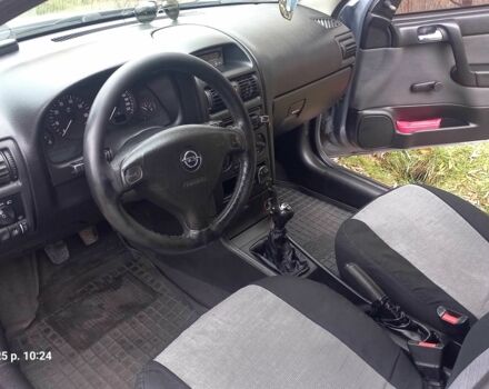 Серый Опель Астра, объемом двигателя 1.4 л и пробегом 212 тыс. км за 4200 $, фото 5 на Automoto.ua