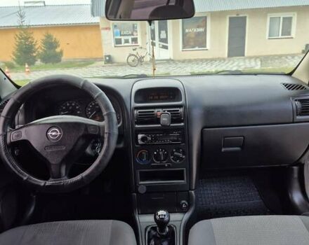 Серый Опель Астра, объемом двигателя 1.4 л и пробегом 361 тыс. км за 3800 $, фото 10 на Automoto.ua