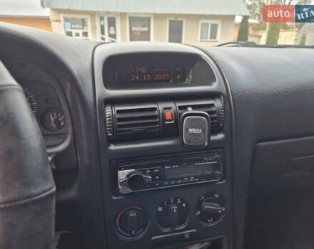 Серый Опель Астра, объемом двигателя 1.4 л и пробегом 361 тыс. км за 3800 $, фото 9 на Automoto.ua