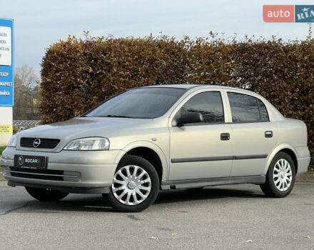 Серый Опель Астра, объемом двигателя 1.36 л и пробегом 77 тыс. км за 3999 $, фото 9 на Automoto.ua