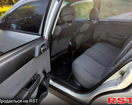 Серый Опель Астра, объемом двигателя 1.4 л и пробегом 198 тыс. км за 3500 $, фото 7 на Automoto.ua