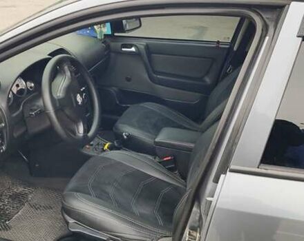 Серый Опель Астра, объемом двигателя 1.4 л и пробегом 156 тыс. км за 4500 $, фото 28 на Automoto.ua