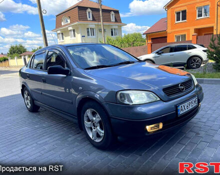 Серый Опель Астра, объемом двигателя 1.4 л и пробегом 250 тыс. км за 2999 $, фото 7 на Automoto.ua