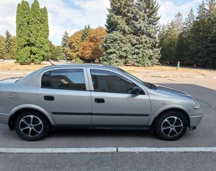 Серый Опель Астра, объемом двигателя 1.4 л и пробегом 260 тыс. км за 3590 $, фото 3 на Automoto.ua