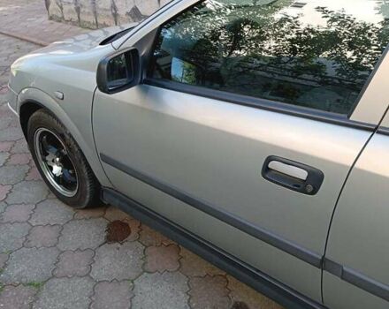 Серый Опель Астра, объемом двигателя 1.4 л и пробегом 189 тыс. км за 3900 $, фото 6 на Automoto.ua