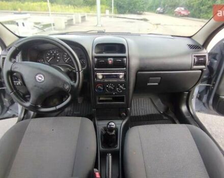 Серый Опель Астра, объемом двигателя 1.39 л и пробегом 145 тыс. км за 3900 $, фото 4 на Automoto.ua