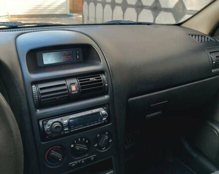 Серый Опель Астра, объемом двигателя 1.4 л и пробегом 189 тыс. км за 3900 $, фото 15 на Automoto.ua