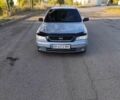 Сірий Опель Астра, об'ємом двигуна 1.4 л та пробігом 223 тис. км за 4200 $, фото 1 на Automoto.ua