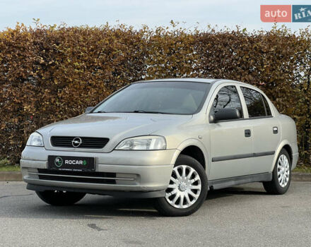 Серый Опель Астра, объемом двигателя 1.36 л и пробегом 77 тыс. км за 3999 $, фото 7 на Automoto.ua