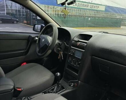 Серый Опель Астра, объемом двигателя 1.4 л и пробегом 185 тыс. км за 4500 $, фото 4 на Automoto.ua