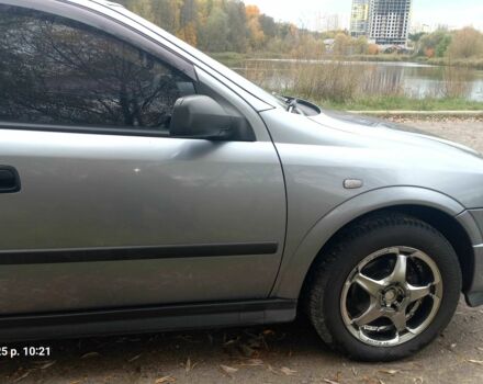 Серый Опель Астра, объемом двигателя 1.4 л и пробегом 212 тыс. км за 4200 $, фото 3 на Automoto.ua