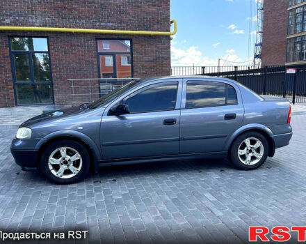 Серый Опель Астра, объемом двигателя 1.4 л и пробегом 250 тыс. км за 2999 $, фото 2 на Automoto.ua