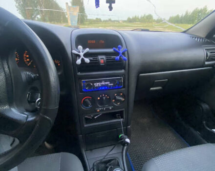 Серый Опель Астра, объемом двигателя 1.4 л и пробегом 200 тыс. км за 3700 $, фото 10 на Automoto.ua