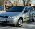 Серый Опель Астра, объемом двигателя 1.4 л и пробегом 120 тыс. км за 3999 $, фото 1 на Automoto.ua